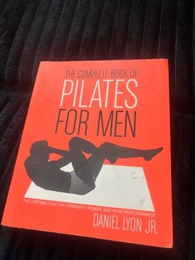 Daniel Lyon Jr. The Complete Book of Pilates for Men - Orange Cover